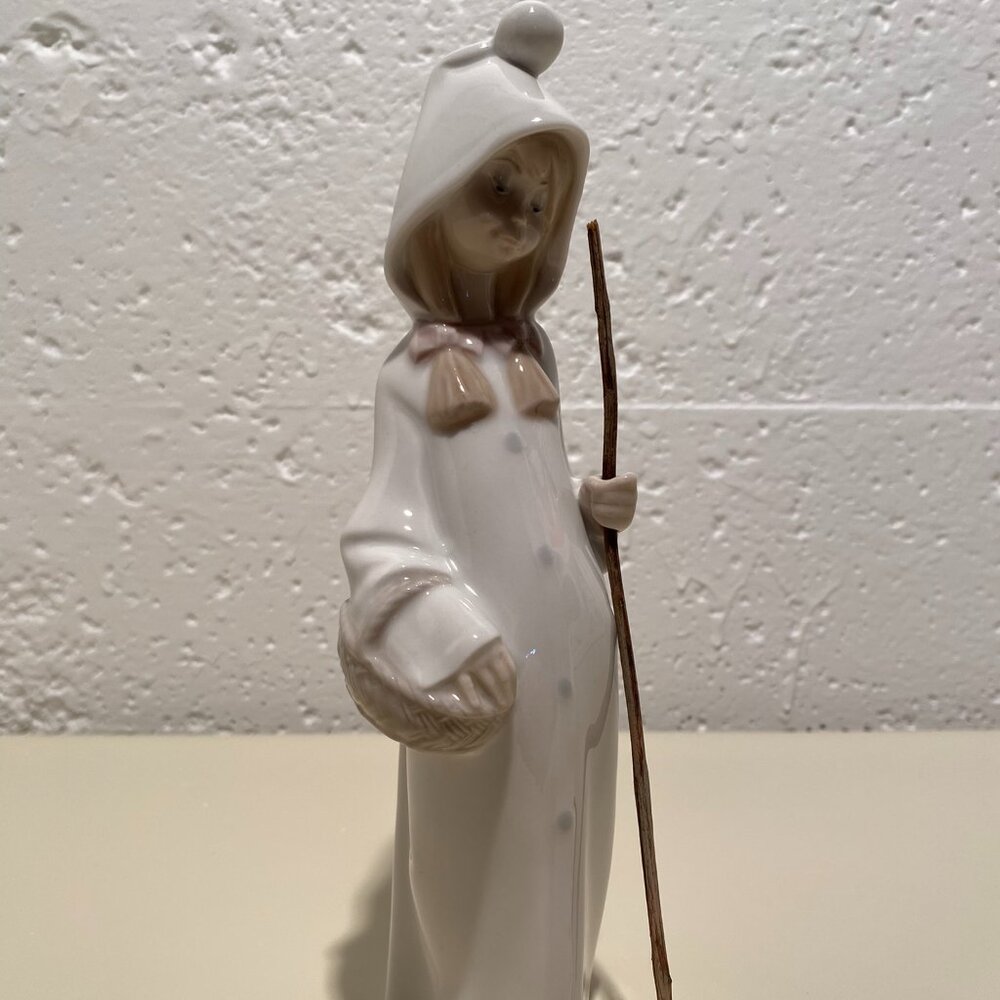 Lladro Shepherdess with Basket Porcelain Figurine